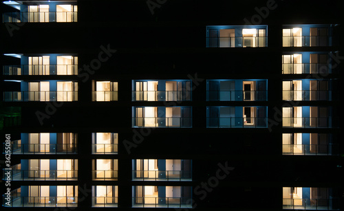lighted empty night windows facade view