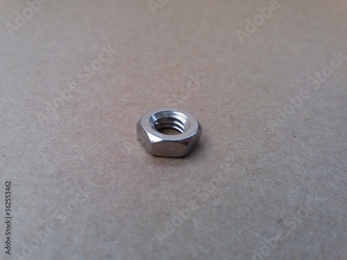 nut is a type of fastener with a threaded hole