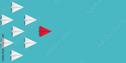 Leadership success concept paper plane fly over blue background. New idea, courage, new thinking, creative decision, think differently. Lead airplane stand out of other paper plane follower