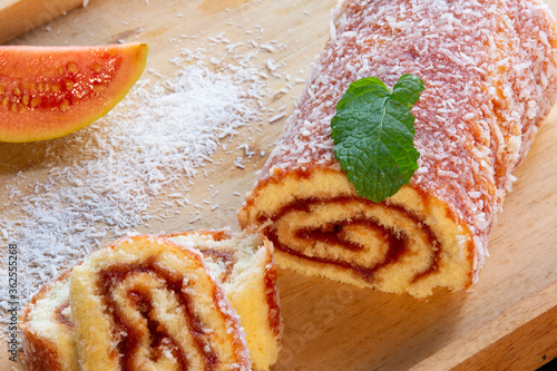 Bolo de Rolo (Swiss roll, Roll cake) typical Brazilian dessert, from the northeast region. Sliced ​​cake roll with guava paste.