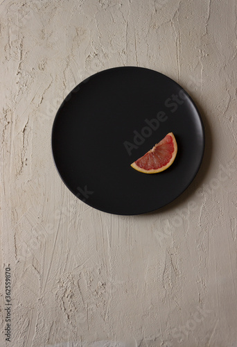 Grapefruit isolated on texture background. Ketogenic diet. Vegetables.