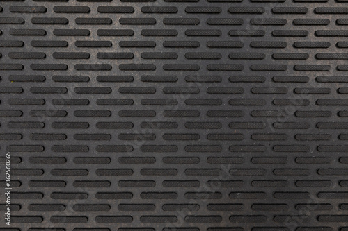 black rubber floor mat close-up photo