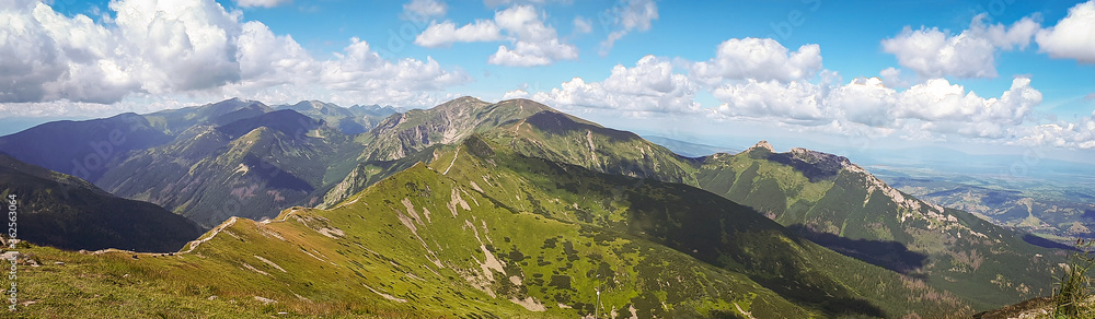 Summer panoramic view of Tatra Mountains, Kasprowy Wierch. Panorama landscape. Hiking concept scenery.