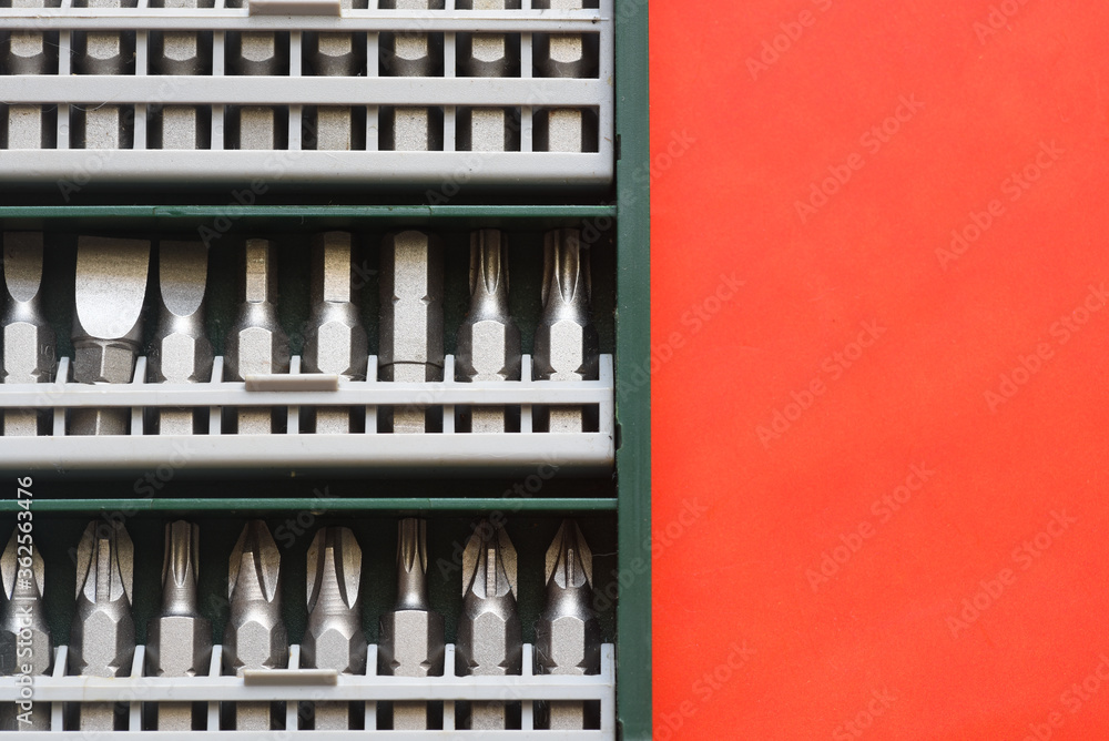 Close up photo of Drill bit set on red background