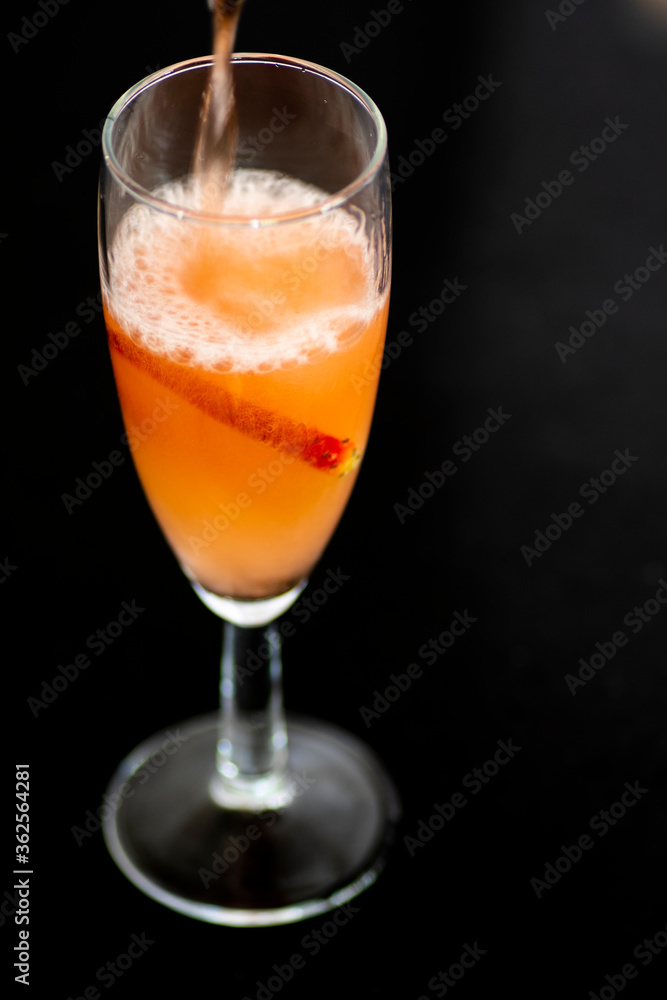 A glass of rose wine with strawberries A glass of rose wine with strawberries