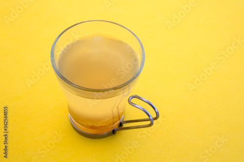 Glass Cup with fresh Yuzu tea photo