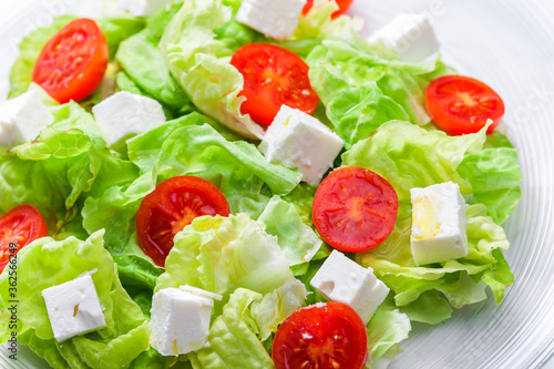 salad with fresh vegetables, feta cheese and tomatoes