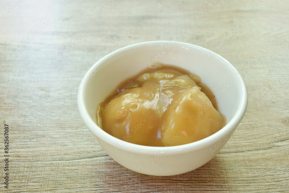 mashed potato dressing gravy sauce in cup on table mashed potato dressing gravy sauce in cup on table
