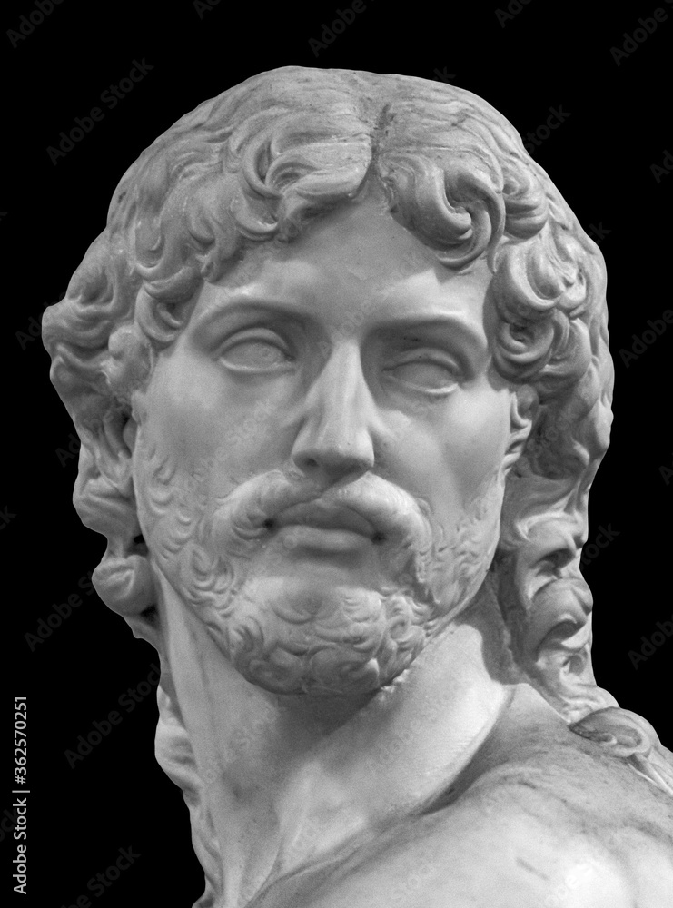 Black and white photo of ancient marble sculpture showing bust of handsome mature man