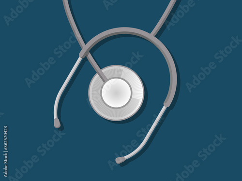 Silver stethoscope on dark blue background