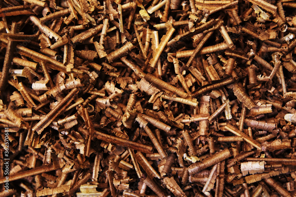Wood shavings. Brown wood background Wood shavings. Brown wood background