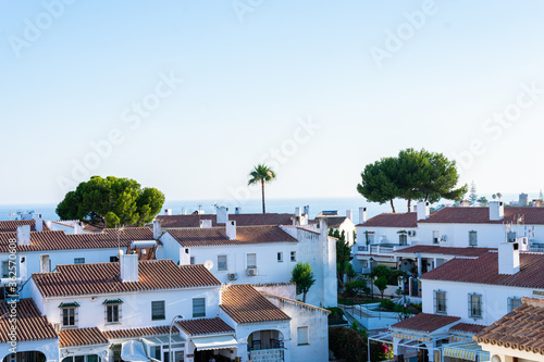 Coast city and blue landscape with white houses in Malaga © Rocío González 