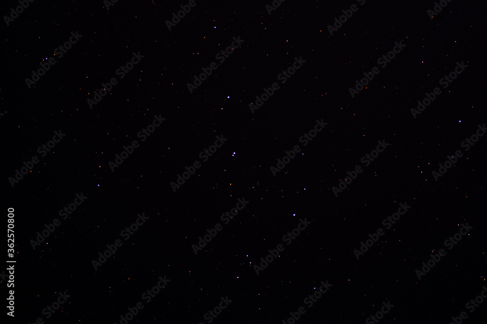 Bright stars in the black night sky. Astrophotography, various constellations of the Northern hemisphere. URSA major.