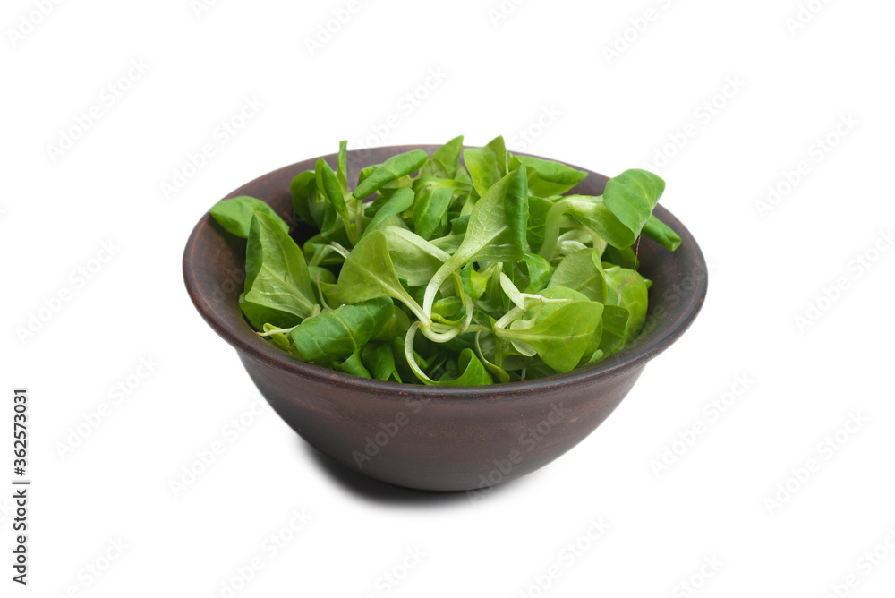 Mash salad in ceramic brown bowl isolated on white. Mash salad in ceramic brown bowl isolated on white.