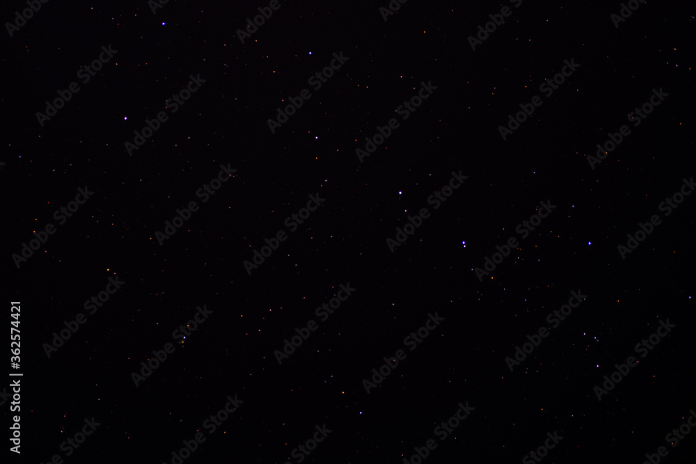 Bright stars in the black night sky. Astrophotography, various constellations of the Northern hemisphere. URSA major.