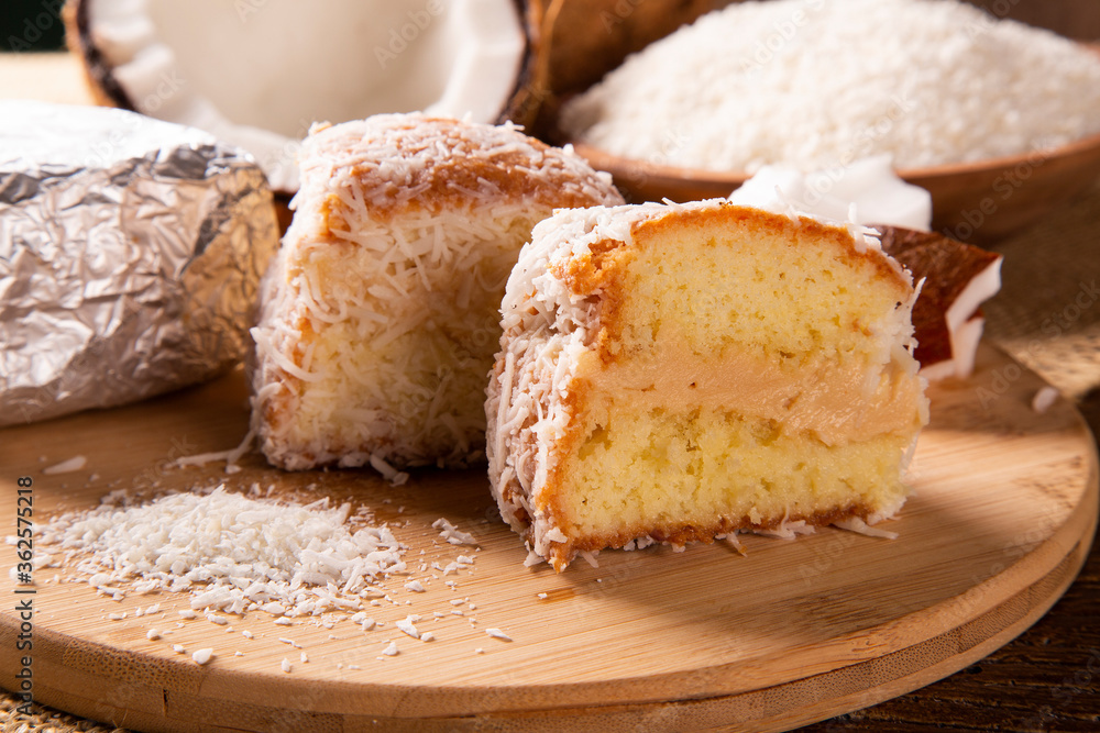 Traditional iced cake with coconut and milk sweet wrapped in aluminum foil.