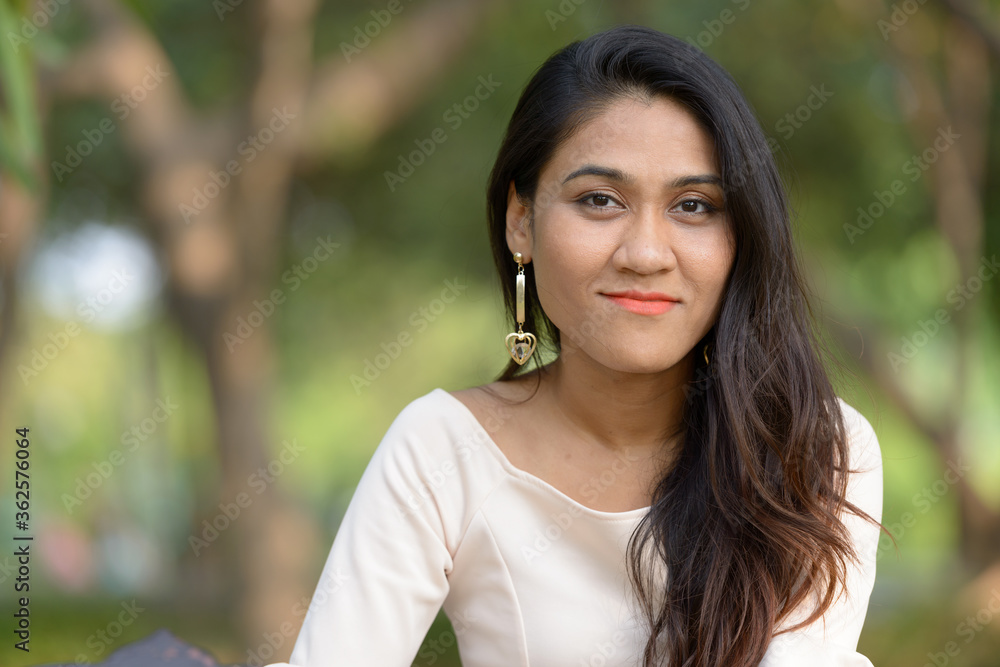 Face of Asian businesswoman at the park Face of Asian businesswoman at the park