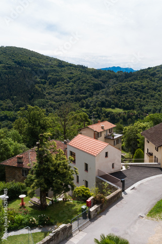 Small rustic country house exterior  nobody around and Swiss linear architecture  top view  photo taken with a drone