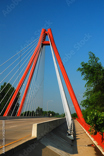 The red, modern Second Avenue Bridge is the main thoroughfare into Columbus, Indiana photo