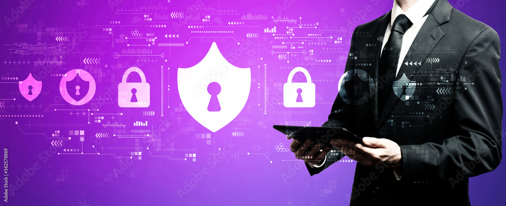 Fototapeta premium Cyber security theme with businessman using his tablet computer