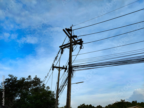 electric pole with blue sky background