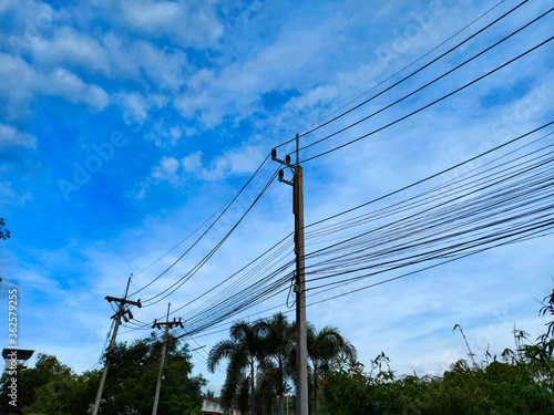 electric pole with blue sky background