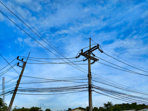electric pole with blue sky background