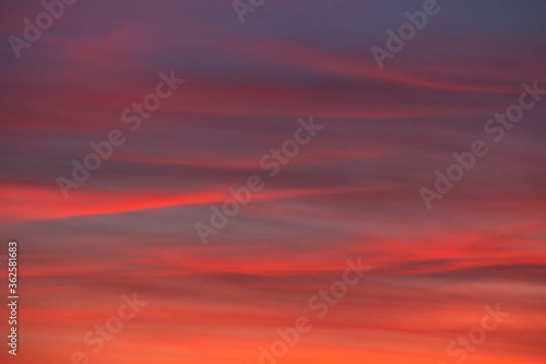 background of sunset cloudscape with red clouds © mimadeo