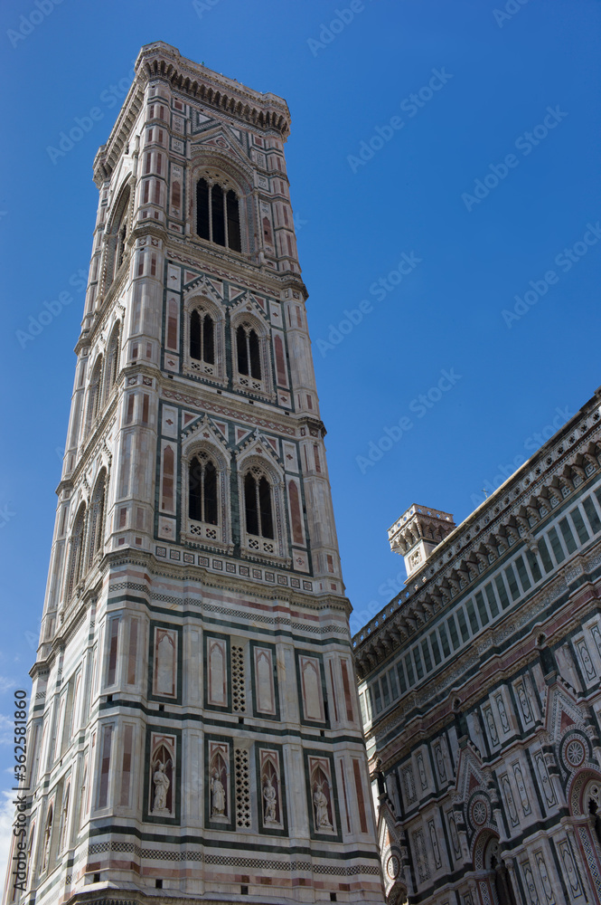 View on the tower of the dome of Santa Maria del Fiore church in Florence, Italy with blue sky