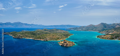 Panorama of Island of Spinalonga with old fortress former leper colony and the bay of Elounda  Crete island  Greece