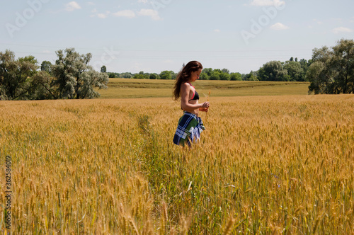 Wallpaper Mural Beautiful sexy girl cowboy with spikelet. girl in style of Wild West. Cowgirl western cowboy style woman walking in Valley. young girl in summer outdoors, Arizona Utah, USA. meet the sunset Torontodigital.ca
