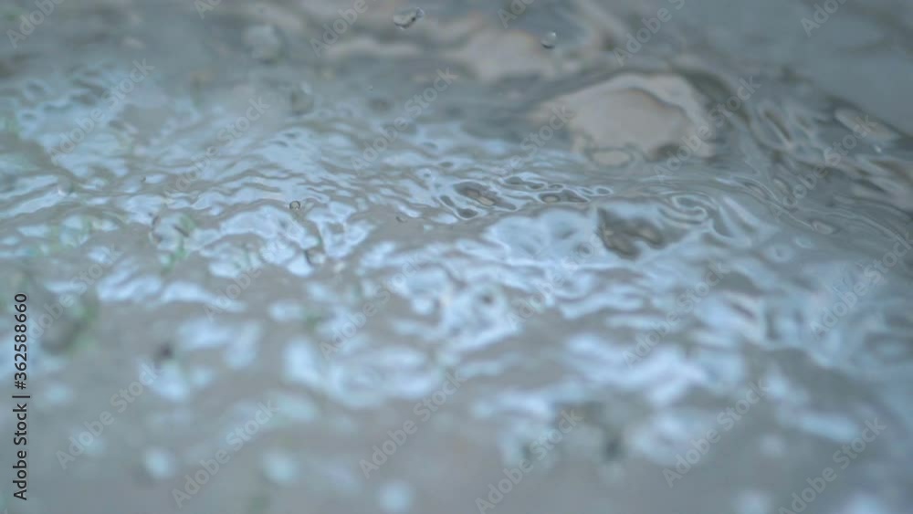 Drops falling on the water in slow motion 180fps Drops falling on the water in slow motion 180fps
