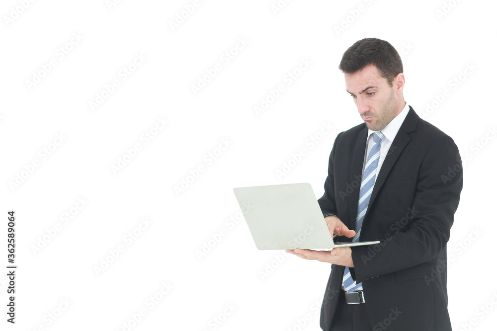 Successful and handsome businessman in a suit smiling with hand holding notebook. He serious in working on a laptop isolated on white background. Copy space Successful and handsome businessman in a suit smiling with hand holding notebook. He serious in working on a laptop isolated on white background. Copy space