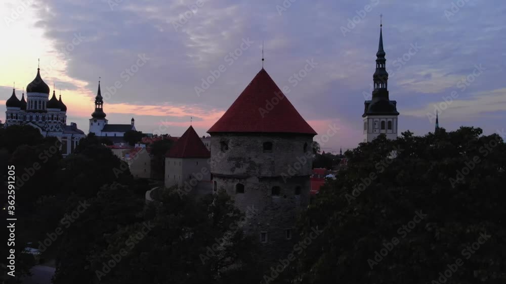 Amazing aerial Tallinn view over the old town, cathedral and narrow streets surrounded by red roofs. Amazing aerial Tallinn view over the old town, cathedral and narrow streets surrounded by red roofs.