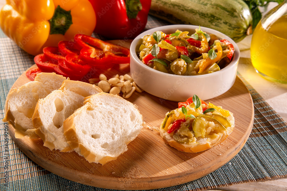 Cooking of zucchini salad with vegetables , tomatoes, pepper, olive and vegetable oil. Cooking of zucchini salad with vegetables , tomatoes, pepper, olive and vegetable oil.