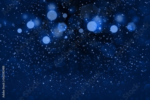 blue beautiful shining glitter lights defocused bokeh abstract background with sparks fly, celebratory mockup texture with blank space for your content