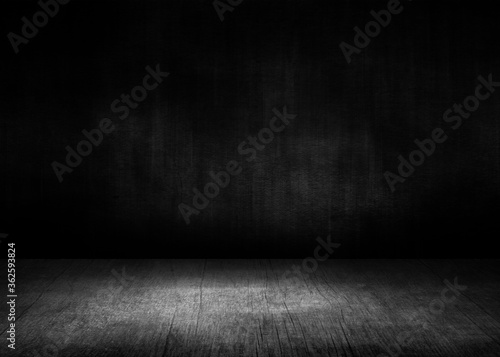 Wooden table on dark background with space for your text