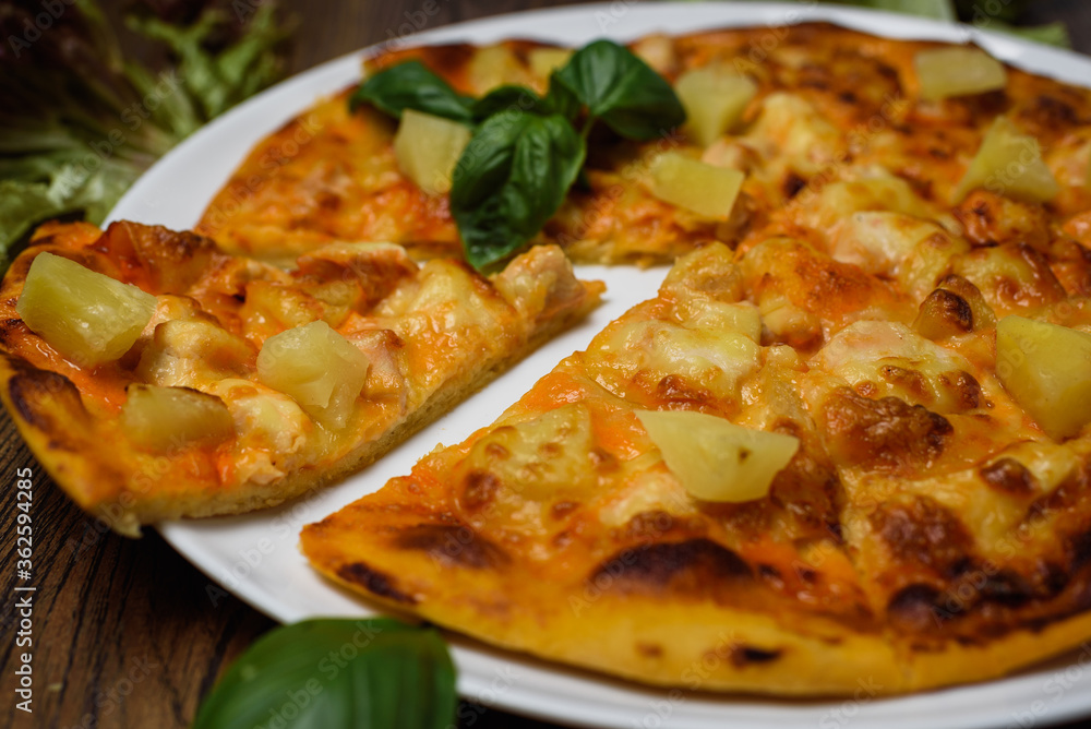pizza with meat and tomatoes under cheese
pizza with meat and tomatoes under cheese