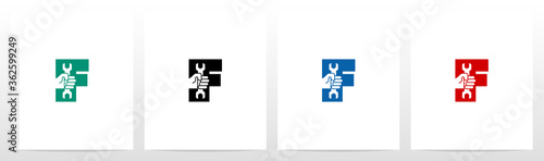 Hand Holding Wrench On Letter Logo Design F