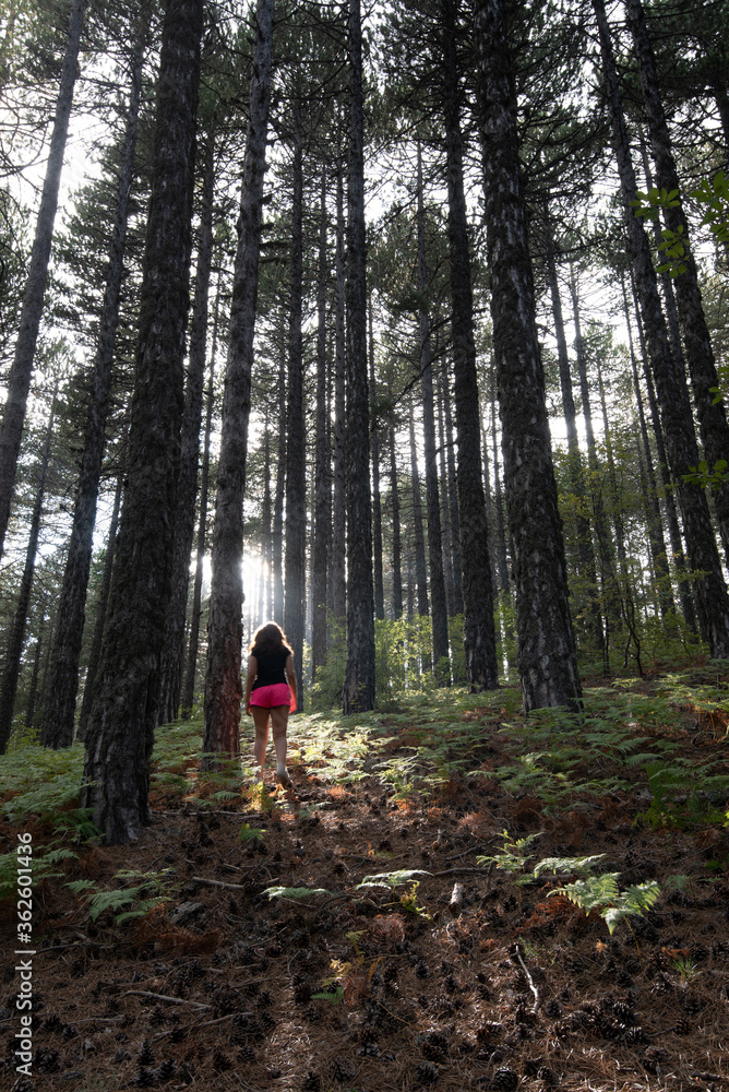 Woman walking in the forest Troodos mountains Cyprus Woman walking in the forest Troodos mountains Cyprus