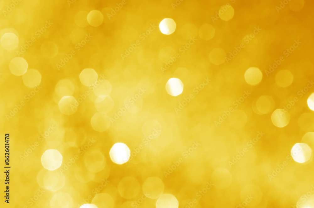 abstract defocused yellow bokeh sparkling light glitter background. for wallpaper backdrop and template. abstract defocused yellow bokeh sparkling light glitter background. for wallpaper backdrop and template.