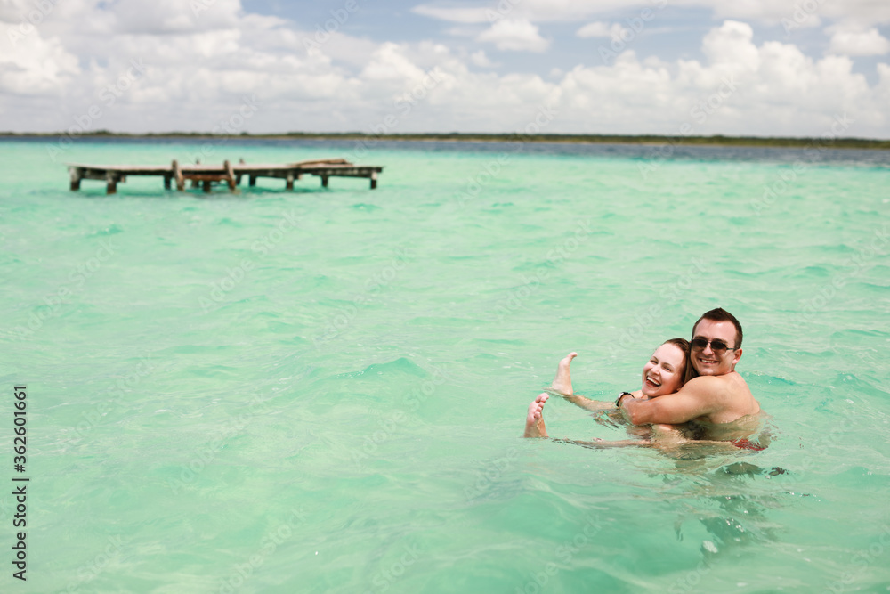 Couple on a tropical beach at Maldives