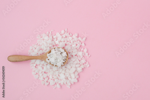 Sea salt in a wooden spoon ...