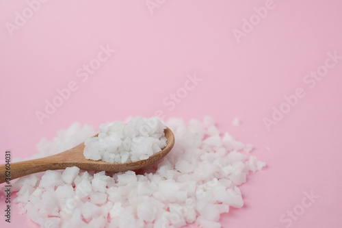Sea salt in a wooden spoon ...