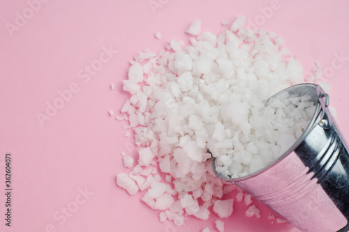 Sea salt in a tin bucket on...