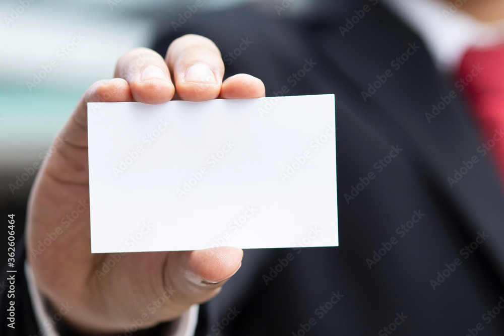 business man in hand hold show blank white credit name card display front mock up with rounded corners. Business branding concept. business man in hand hold show blank white credit name card display front mock up with rounded corners. Business branding concept.