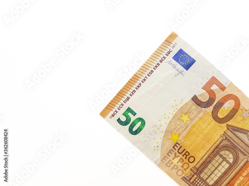 Paper money of the euro on a white background neatly laid out, straight, smooth. Denomination twenty, ten, fifty, five euros. Savings. Saving. Credit. Spare pillow for a rainy day.