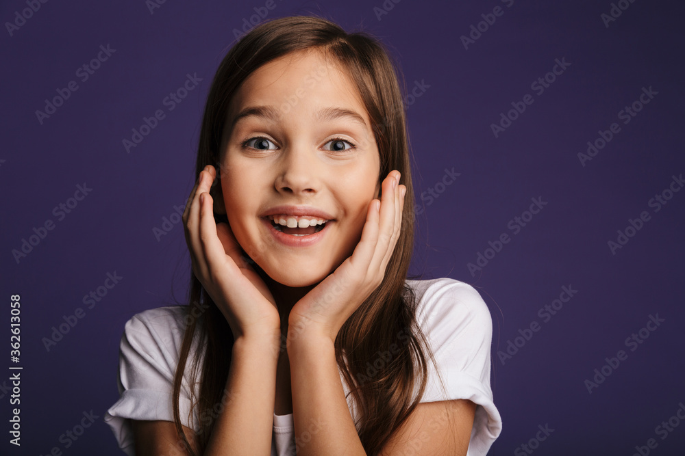 Photo of cheerful beautiful girl smiling and looking at camera Photo of cheerful beautiful girl smiling and looking at camera