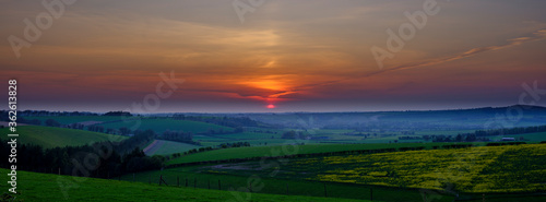 Meon Hut, UK - April 10, 2020: Sunset over Beacon Hill from near Old Winchester Hill, Hampshire, UK