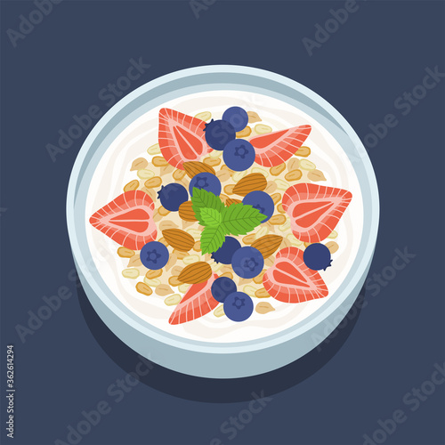 Muesli fruits  healthy natural breakfast. Oat flakes in a bowl with blueberries, strawberries and granola. Healthy food for breakfast.